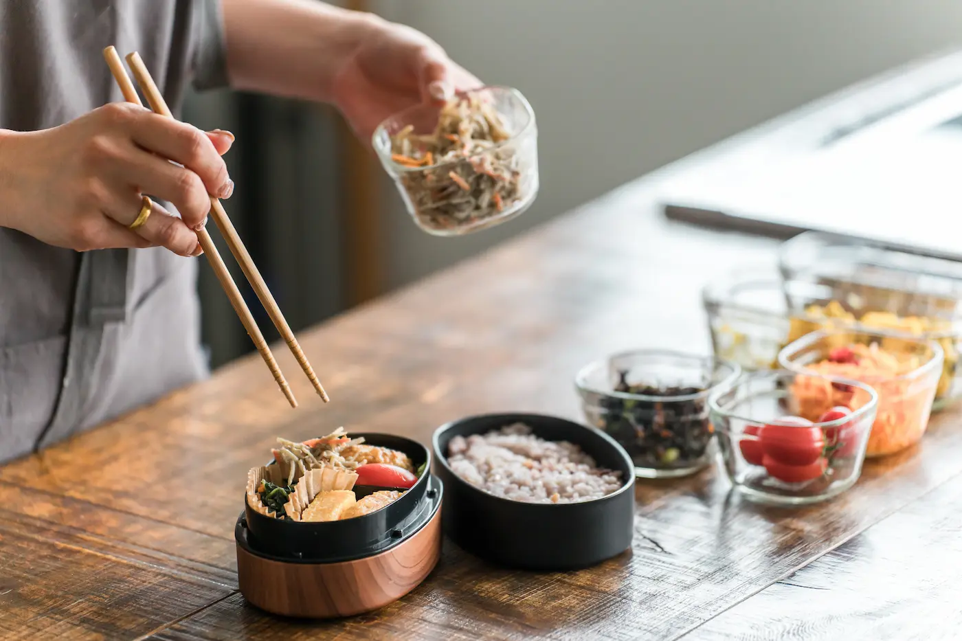 Packing food into a lunch box
